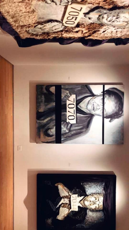 The paintings 7070 and 7044 hung on a gallery wall