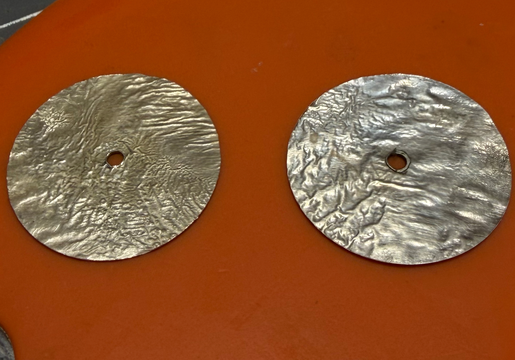 Two reticulated sterling silver dial blanks