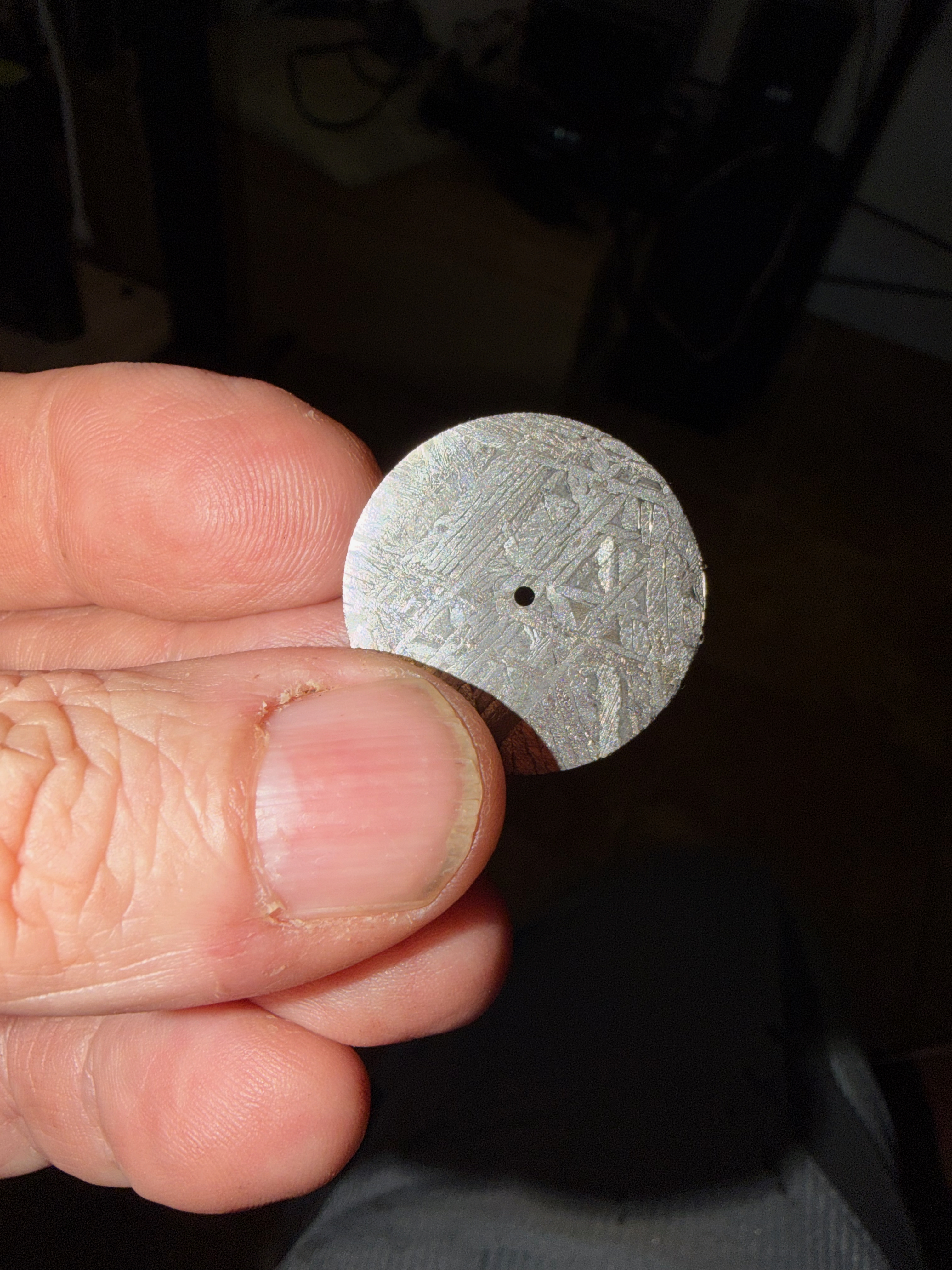 An etched meteorite dial blank