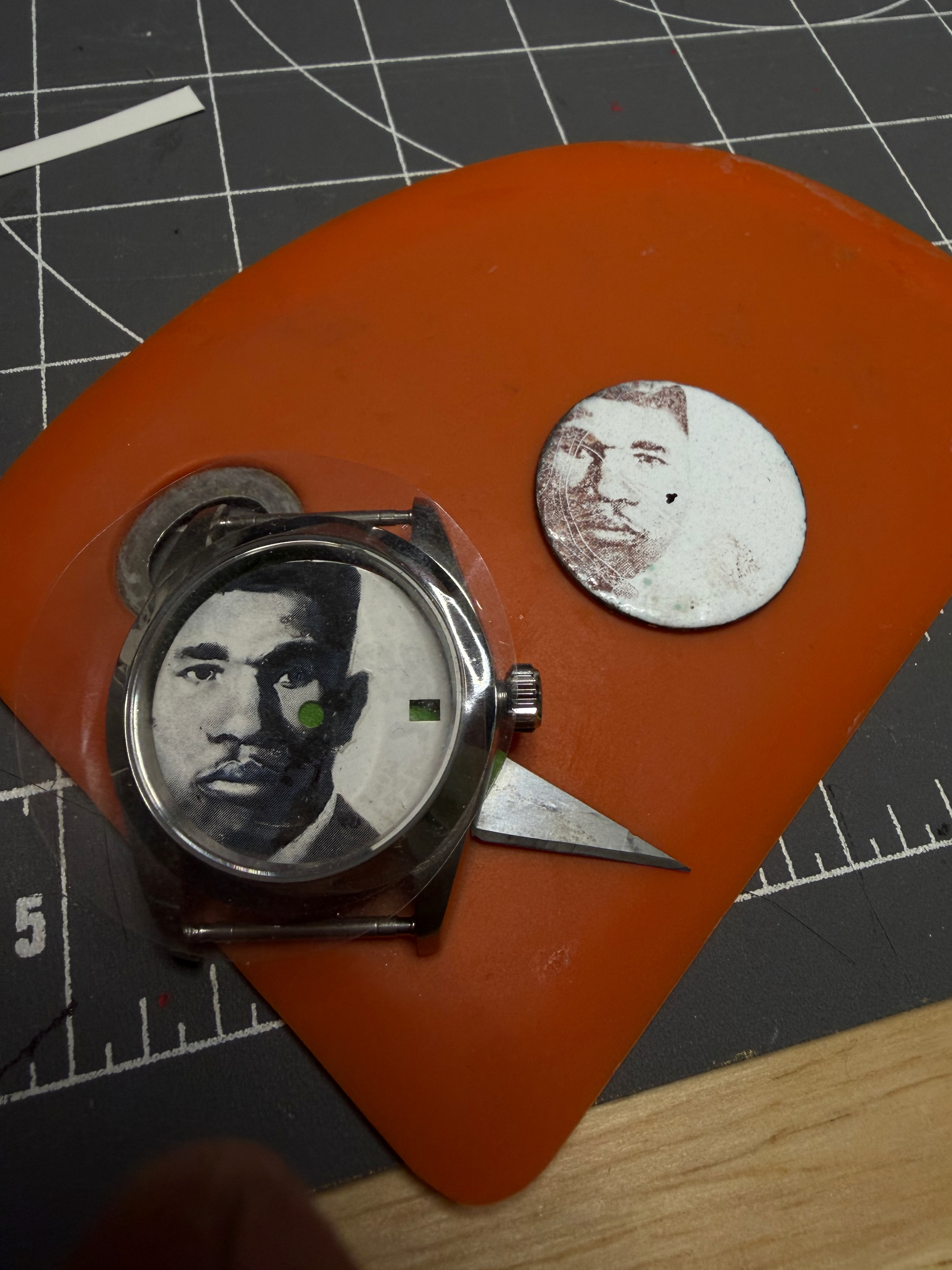 A press-portrait dial cased in polished steel